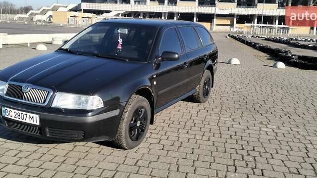 Черный Шкода Октавия, объемом двигателя 1.6 л и пробегом 287 тыс. км за 3900 $, фото 1 на Automoto.ua