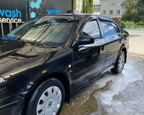 Чорний Шкода Октавія, об'ємом двигуна 1.8 л та пробігом 250 тис. км за 4000 $, фото 1 на Automoto.ua