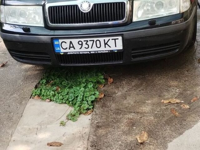 Черный Шкода Октавия, объемом двигателя 1.8 л и пробегом 260 тыс. км за 4250 $, фото 1 на Automoto.ua
