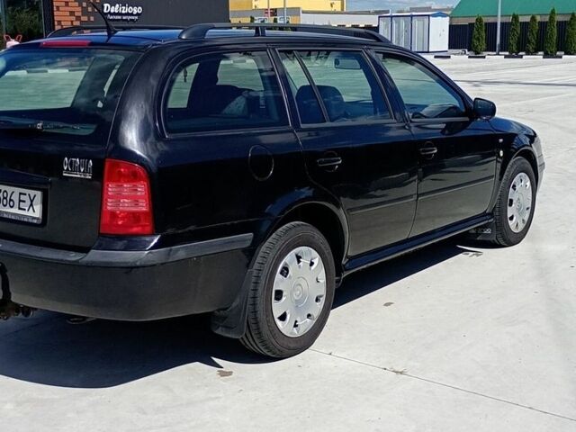 Чорний Шкода Октавія, об'ємом двигуна 1.6 л та пробігом 345 тис. км за 3900 $, фото 1 на Automoto.ua