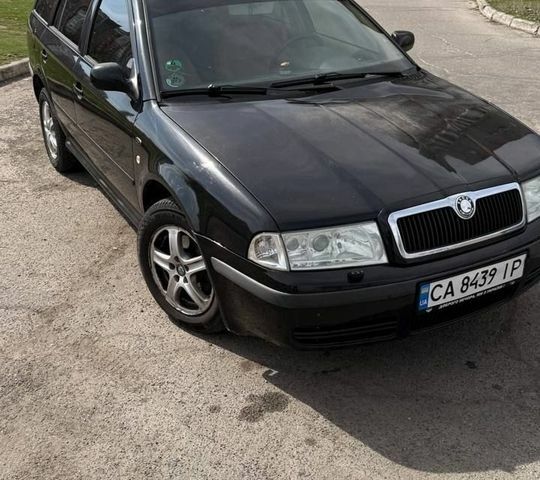 Чорний Шкода Октавія, об'ємом двигуна 1.78 л та пробігом 256 тис. км за 3800 $, фото 1 на Automoto.ua