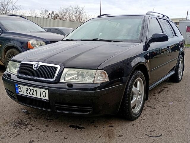 Черный Шкода Октавия, объемом двигателя 1.8 л и пробегом 333 тыс. км за 4500 $, фото 1 на Automoto.ua