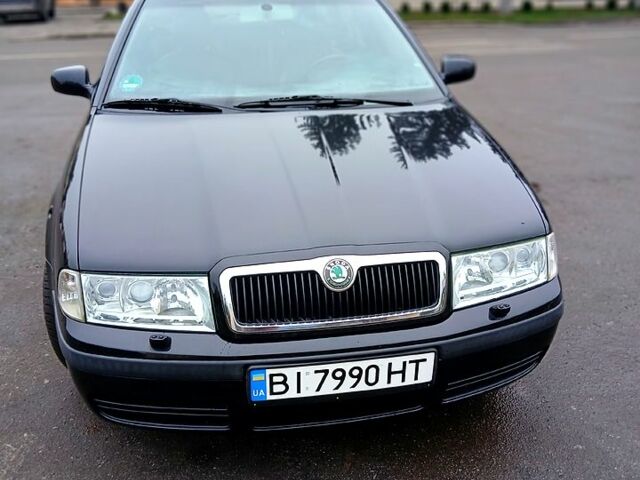 Черный Шкода Октавия, объемом двигателя 1.8 л и пробегом 205 тыс. км за 5500 $, фото 1 на Automoto.ua
