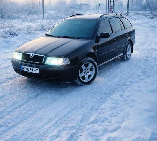 Черный Шкода Октавия, объемом двигателя 1.6 л и пробегом 315 тыс. км за 3599 $, фото 1 на Automoto.ua