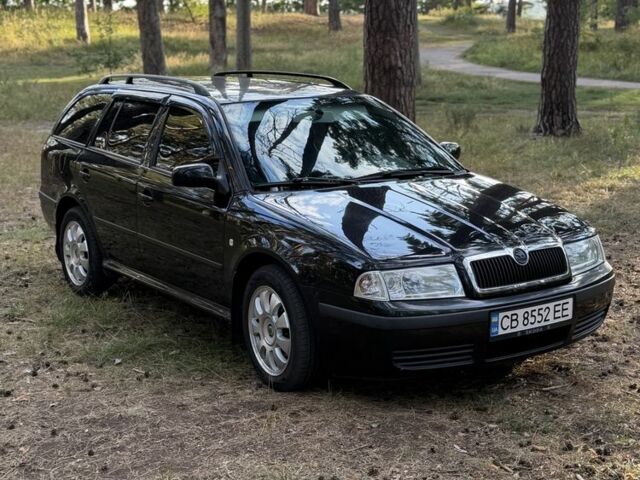 Чорний Шкода Октавія, об'ємом двигуна 2 л та пробігом 259 тис. км за 4810 $, фото 1 на Automoto.ua