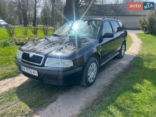 Черный Шкода Октавия, объемом двигателя 1.6 л и пробегом 305 тыс. км за 4200 $, фото 1 на Automoto.ua