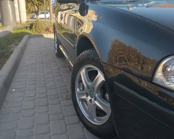 Черный Шкода Октавия, объемом двигателя 1.6 л и пробегом 240 тыс. км за 4449 $, фото 1 на Automoto.ua