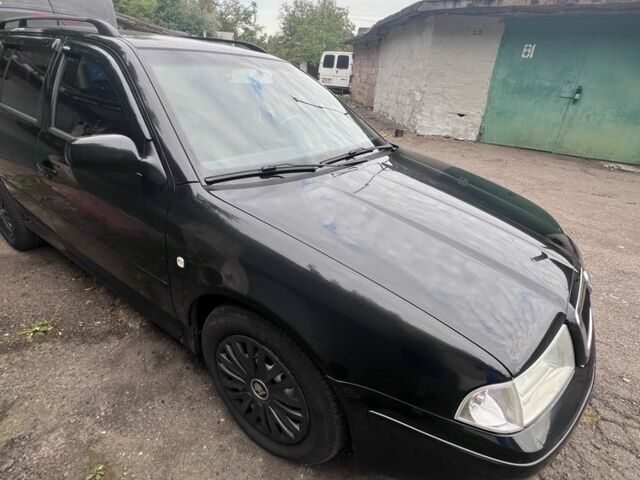 Черный Шкода Октавия, объемом двигателя 2 л и пробегом 241 тыс. км за 6001 $, фото 1 на Automoto.ua