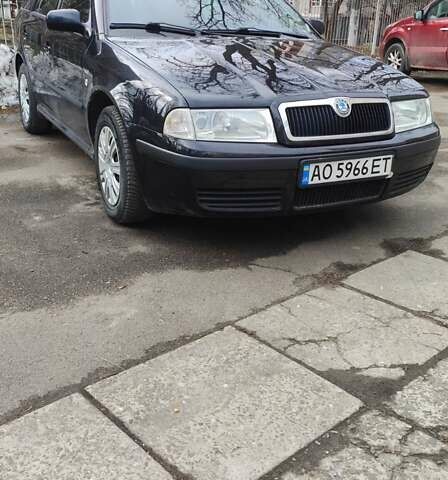 Черный Шкода Октавия, объемом двигателя 1.6 л и пробегом 208 тыс. км за 4890 $, фото 1 на Automoto.ua
