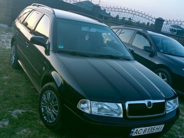 Черный Шкода Октавия, объемом двигателя 1.6 л и пробегом 220 тыс. км за 5010 $, фото 1 на Automoto.ua