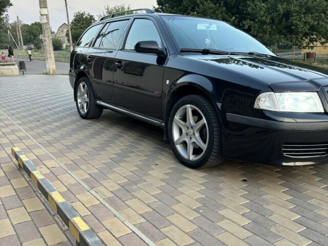 Черный Шкода Октавия, объемом двигателя 1.8 л и пробегом 353 тыс. км за 4600 $, фото 1 на Automoto.ua