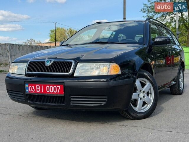 Черный Шкода Октавия, объемом двигателя 1.6 л и пробегом 225 тыс. км за 5650 $, фото 1 на Automoto.ua