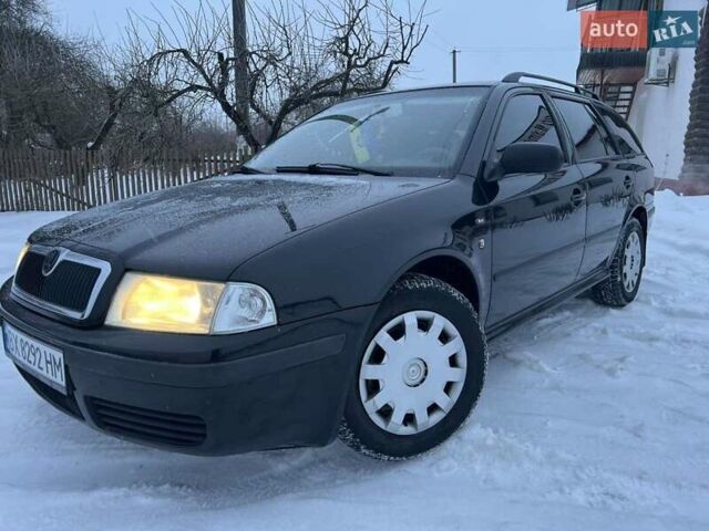 Черный Шкода Октавия, объемом двигателя 2 л и пробегом 319 тыс. км за 4600 $, фото 1 на Automoto.ua