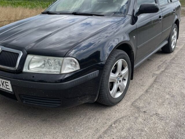 Чорний Шкода Октавія, об'ємом двигуна 1.6 л та пробігом 229 тис. км за 5300 $, фото 1 на Automoto.ua