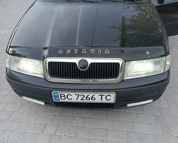 Черный Шкода Октавия, объемом двигателя 1.8 л и пробегом 300 тыс. км за 3700 $, фото 1 на Automoto.ua