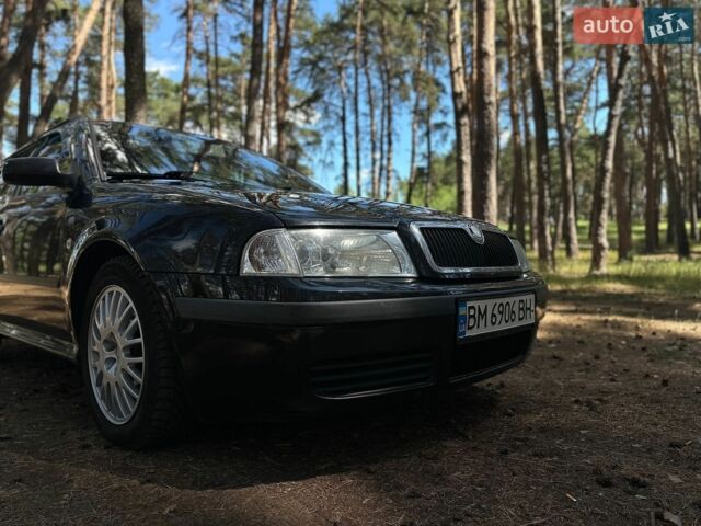 Чорний Шкода Октавія, об'ємом двигуна 2 л та пробігом 246 тис. км за 5500 $, фото 1 на Automoto.ua