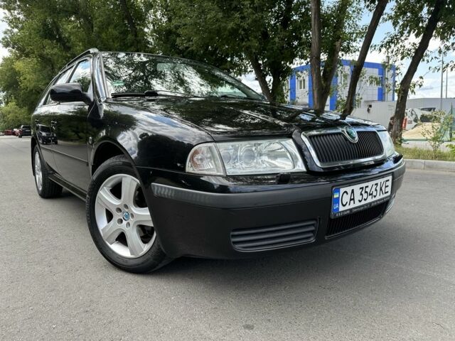 Черный Шкода Октавия, объемом двигателя 1.6 л и пробегом 213 тыс. км за 5600 $, фото 1 на Automoto.ua