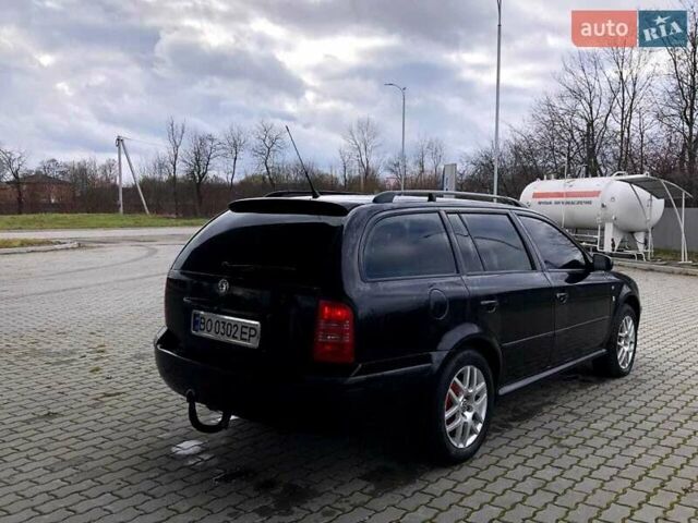 Черный Шкода Октавия, объемом двигателя 1.6 л и пробегом 234 тыс. км за 4500 $, фото 1 на Automoto.ua