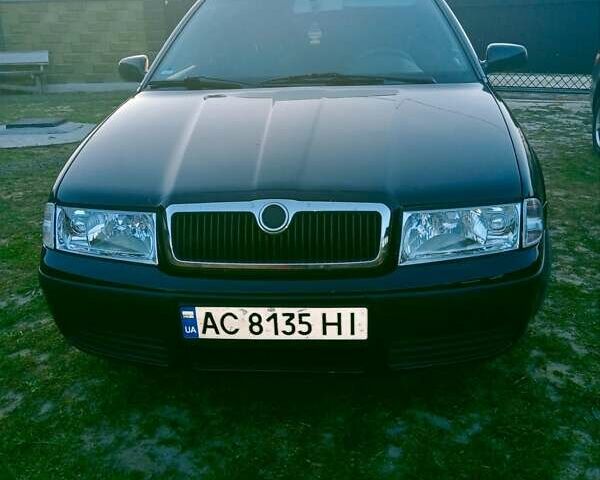 Черный Шкода Октавия, объемом двигателя 1.6 л и пробегом 220 тыс. км за 4600 $, фото 1 на Automoto.ua