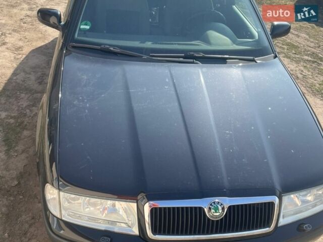 Черный Шкода Октавия, объемом двигателя 1.6 л и пробегом 222 тыс. км за 5500 $, фото 1 на Automoto.ua