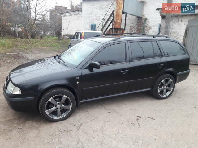Черный Шкода Октавия, объемом двигателя 1.6 л и пробегом 204 тыс. км за 5200 $, фото 1 на Automoto.ua