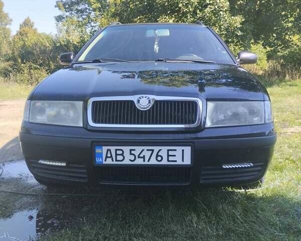 Черный Шкода Октавия, объемом двигателя 1.6 л и пробегом 244 тыс. км за 5700 $, фото 1 на Automoto.ua