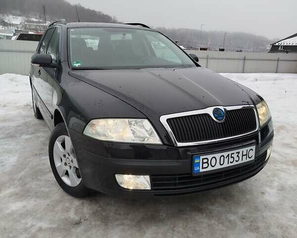 Черный Шкода Октавия, объемом двигателя 1.6 л и пробегом 207 тыс. км за 5600 $, фото 1 на Automoto.ua