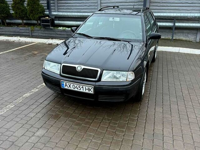 Чорний Шкода Октавія, об'ємом двигуна 1.6 л та пробігом 261 тис. км за 5700 $, фото 1 на Automoto.ua