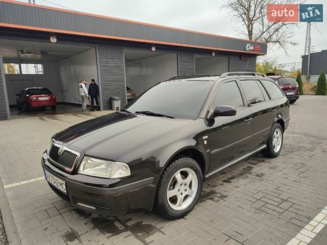 Черный Шкода Октавия, объемом двигателя 1.6 л и пробегом 250 тыс. км за 5200 $, фото 1 на Automoto.ua