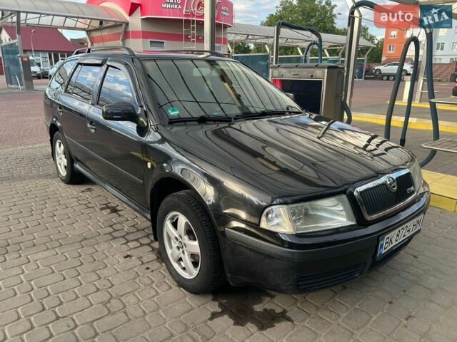 Чорний Шкода Октавія, об'ємом двигуна 1.6 л та пробігом 330 тис. км за 4100 $, фото 1 на Automoto.ua