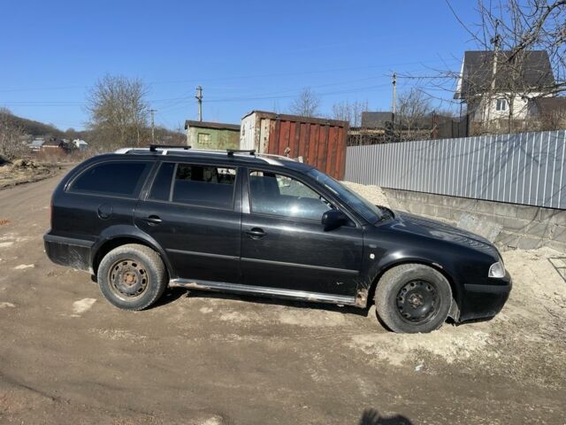 Черный Шкода Октавия, объемом двигателя 2 л и пробегом 370 тыс. км за 2843 $, фото 1 на Automoto.ua