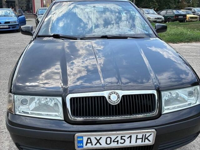 Черный Шкода Октавия, объемом двигателя 1.6 л и пробегом 290 тыс. км за 4500 $, фото 1 на Automoto.ua