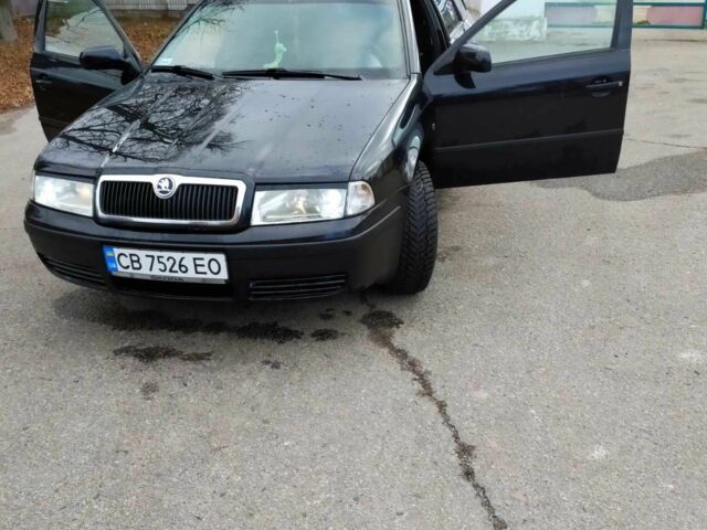 Черный Шкода Октавия, объемом двигателя 1.6 л и пробегом 255 тыс. км за 5500 $, фото 1 на Automoto.ua