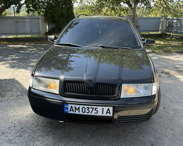 Черный Шкода Октавия, объемом двигателя 1.6 л и пробегом 421 тыс. км за 4600 $, фото 1 на Automoto.ua
