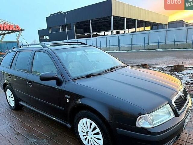 Черный Шкода Октавия, объемом двигателя 2 л и пробегом 286 тыс. км за 4800 $, фото 1 на Automoto.ua