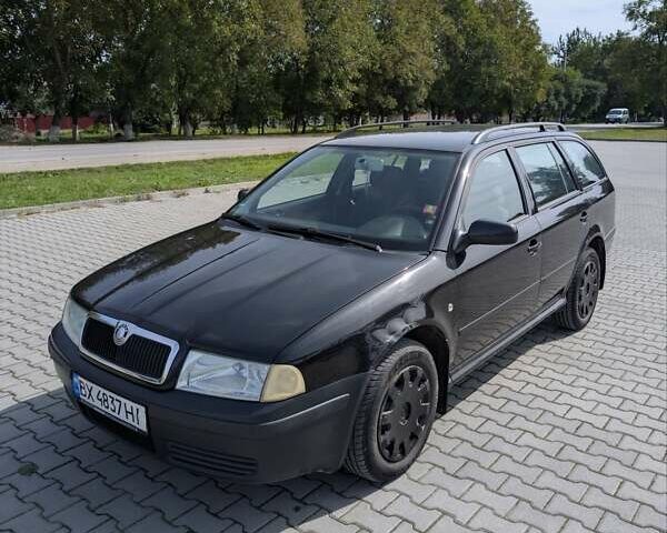 Черный Шкода Октавия, объемом двигателя 1.6 л и пробегом 257 тыс. км за 4100 $, фото 1 на Automoto.ua