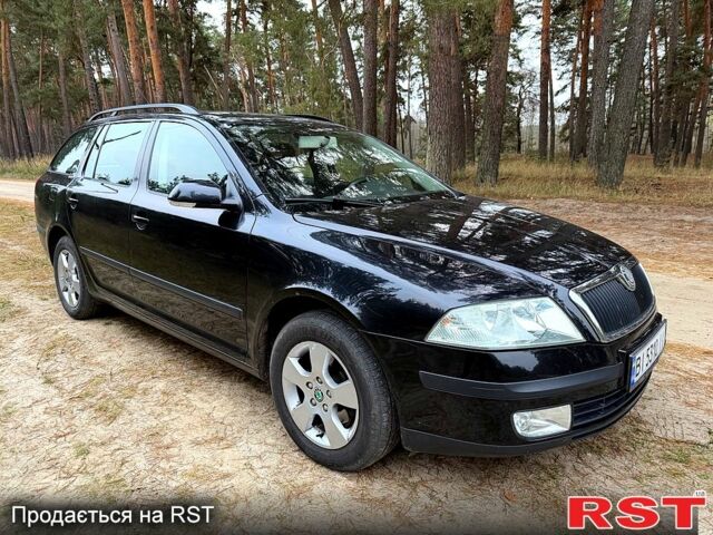 Черный Шкода Октавия, объемом двигателя 1.6 л и пробегом 220 тыс. км за 5450 $, фото 1 на Automoto.ua