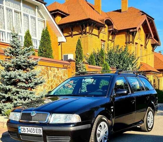 Черный Шкода Октавия, объемом двигателя 1.6 л и пробегом 197 тыс. км за 8000 $, фото 1 на Automoto.ua