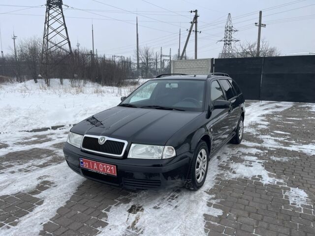 Черный Шкода Октавия, объемом двигателя 1.6 л и пробегом 217 тыс. км за 4600 $, фото 1 на Automoto.ua