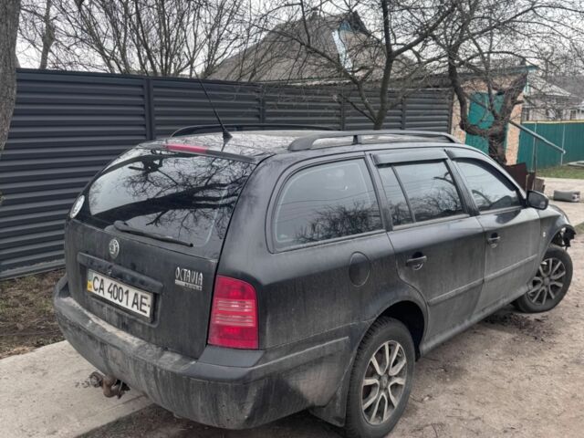 Черный Шкода Октавия, объемом двигателя 1.6 л и пробегом 250 тыс. км за 2250 $, фото 1 на Automoto.ua