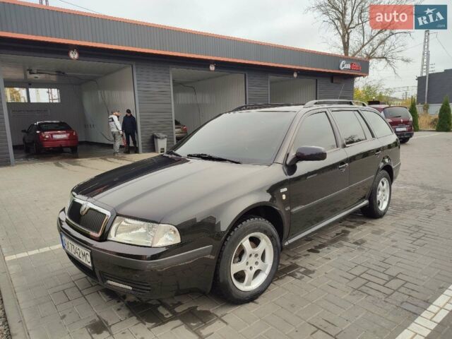 Черный Шкода Октавия, объемом двигателя 1.6 л и пробегом 250 тыс. км за 5400 $, фото 1 на Automoto.ua