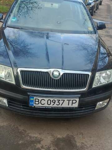 Черный Шкода Октавия, объемом двигателя 1.6 л и пробегом 235 тыс. км за 5400 $, фото 1 на Automoto.ua