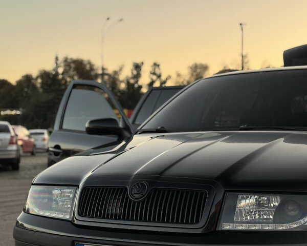 Черный Шкода Октавия, объемом двигателя 1.78 л и пробегом 338 тыс. км за 6500 $, фото 1 на Automoto.ua