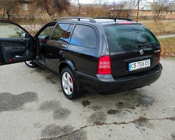 Черный Шкода Октавия, объемом двигателя 1.6 л и пробегом 255 тыс. км за 5500 $, фото 1 на Automoto.ua