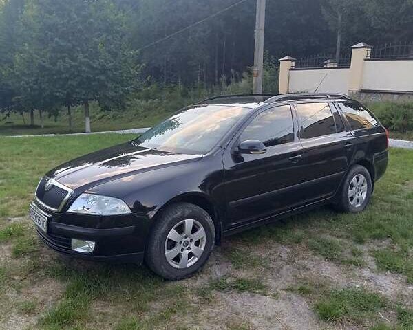 Черный Шкода Октавия, объемом двигателя 1.6 л и пробегом 252 тыс. км за 5800 $, фото 1 на Automoto.ua