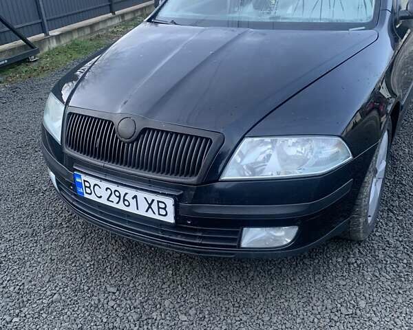 Черный Шкода Октавия, объемом двигателя 1.97 л и пробегом 293 тыс. км за 5600 $, фото 1 на Automoto.ua