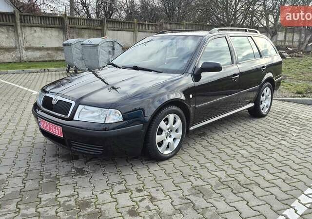 Черный Шкода Октавия, объемом двигателя 1.6 л и пробегом 217 тыс. км за 5700 $, фото 1 на Automoto.ua