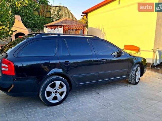 Черный Шкода Октавия, объемом двигателя 2 л и пробегом 312 тыс. км за 7700 $, фото 1 на Automoto.ua