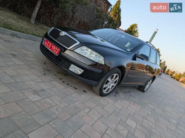 Черный Шкода Октавия, объемом двигателя 1.6 л и пробегом 221 тыс. км за 5900 $, фото 1 на Automoto.ua