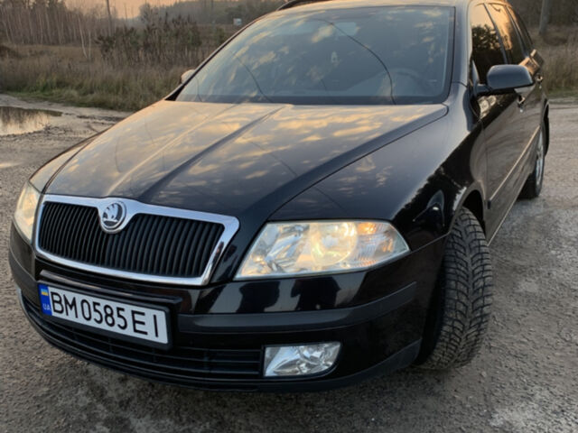 Черный Шкода Октавия, объемом двигателя 1.6 л и пробегом 265 тыс. км за 5700 $, фото 1 на Automoto.ua